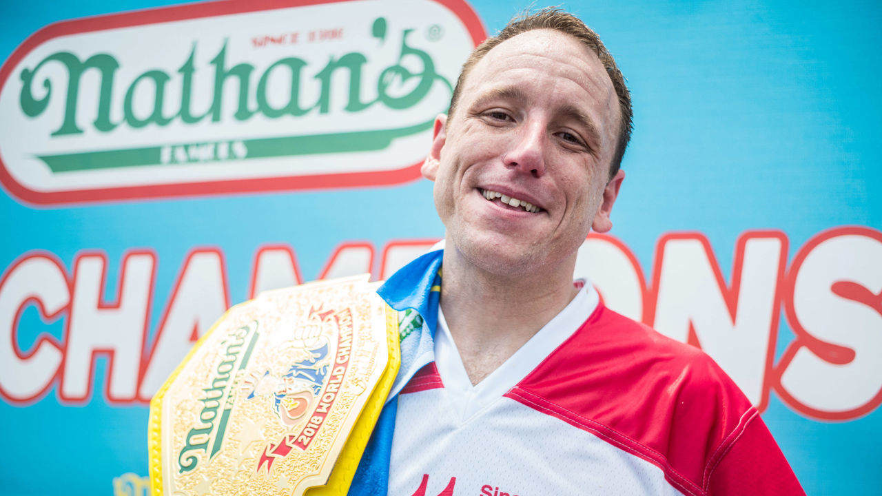 NEW YORK, NY - JULY 04: Joey Chestnut wins the 2018 Nathan's Hot Dog Eating Contest and sets a new record of eating 74 hot dogs in 10 minutes on July 4, 2018 in the Coney Island neighborhood of the Brooklyn borough of New York City.