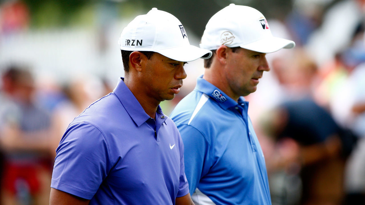 LOUISVILLE, KY - AUGUST 07: (L-R) Tiger Woods of the United States and Padraig Harrington of Ireland walk together up the 17th hole during the first round of the 96th PGA Championship at Valhalla Golf Club on August 7, 2014 in Louisville, Kentucky.