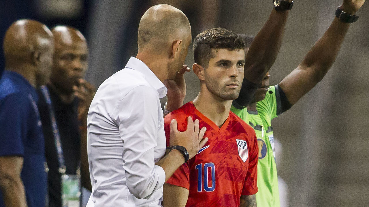KANSAS CITY, KS - JUNE 26: United States midfielder Christian Pulisic (10) receives final instructions from United States head coach Gregg Berhalter before coming onto the pitch during the CONCACAF Gold Cup match between the United States and Panama on Wednesday June 26, 2019 at Children's Mercy Park in Kansas City, KS.