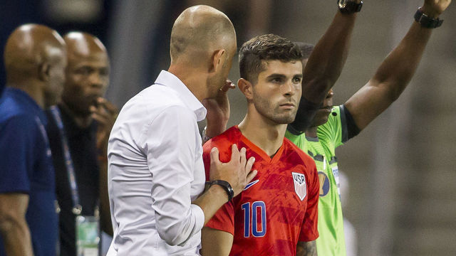 KANSAS CITY, KS - JUNE 26: United States midfielder Christian Pulisic (10) receives final instructions from United States head coach Gregg Berhalter before coming onto the pitch during the CONCACAF Gold Cup match between the United States and Panama on Wednesday June 26, 2019 at Children's Mercy Park in Kansas City, KS.