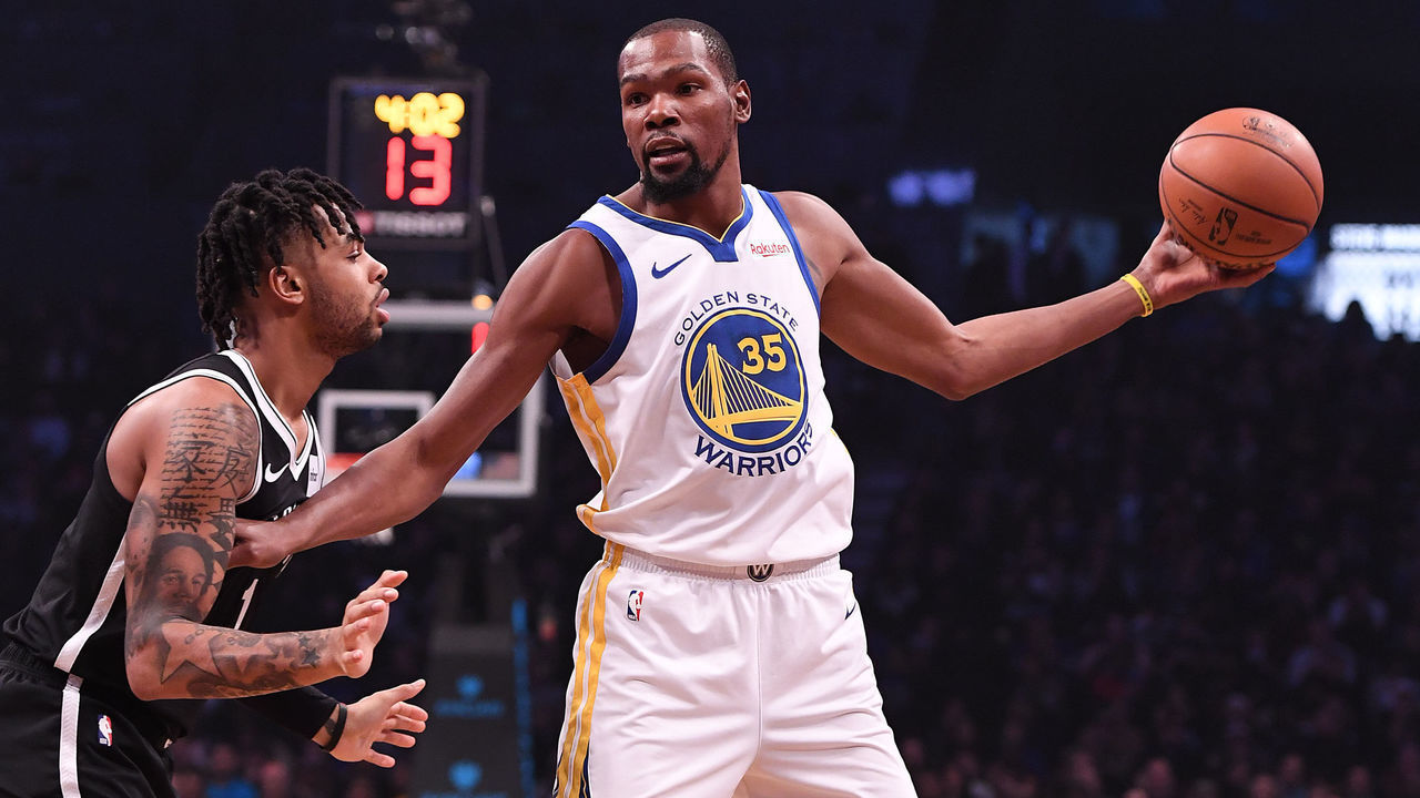 NEW YORK, NY - OCTOBER 28: Kevin Durant #35 of the Golden State Warriors handles the ball against D'Angelo Russell #1 of the Brooklyn Nets during the game at Barclays Center on October 28, 2018 in the Brooklyn borough of New York City.