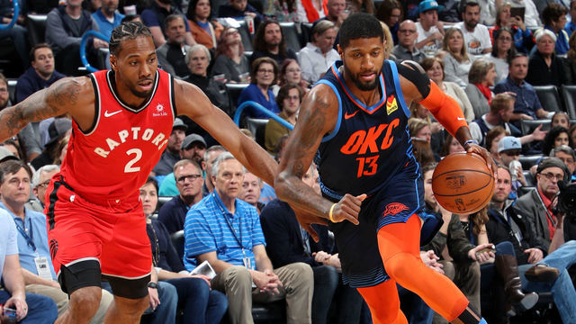 OKLAHOMA CITY, OK- MARCH 20: Paul George #13 of the Oklahoma City Thunder drives to the basket against Kawhi Leonard #2 of the Toronto Raptors on March 20, 2019 at Chesapeake Energy Arena in Oklahoma City, Oklahoma. Mandatory Copyright Notice: Copyright 2019 NBAE