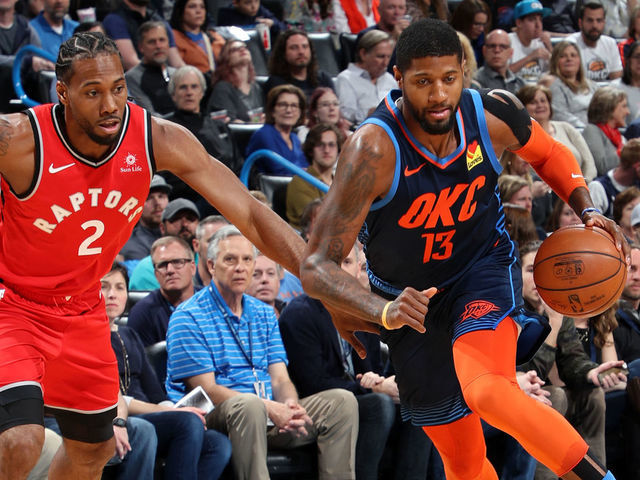 OKLAHOMA CITY, OK- MARCH 20: Paul George #13 of the Oklahoma City Thunder drives to the basket against Kawhi Leonard #2 of the Toronto Raptors on March 20, 2019 at Chesapeake Energy Arena in Oklahoma City, Oklahoma. Mandatory Copyright Notice: Copyright 2019 NBAE