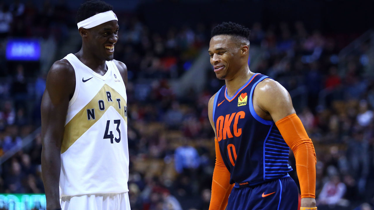 TORONTO, ON - MARCH 22: Pascal Siakam #43 of the Toronto Raptors laughs with Russell Westbrook #0 of the Oklahoma City Thunder during the second half of an NBA game at Scotiabank Arena on March 22, 2019 in Toronto, Canada.