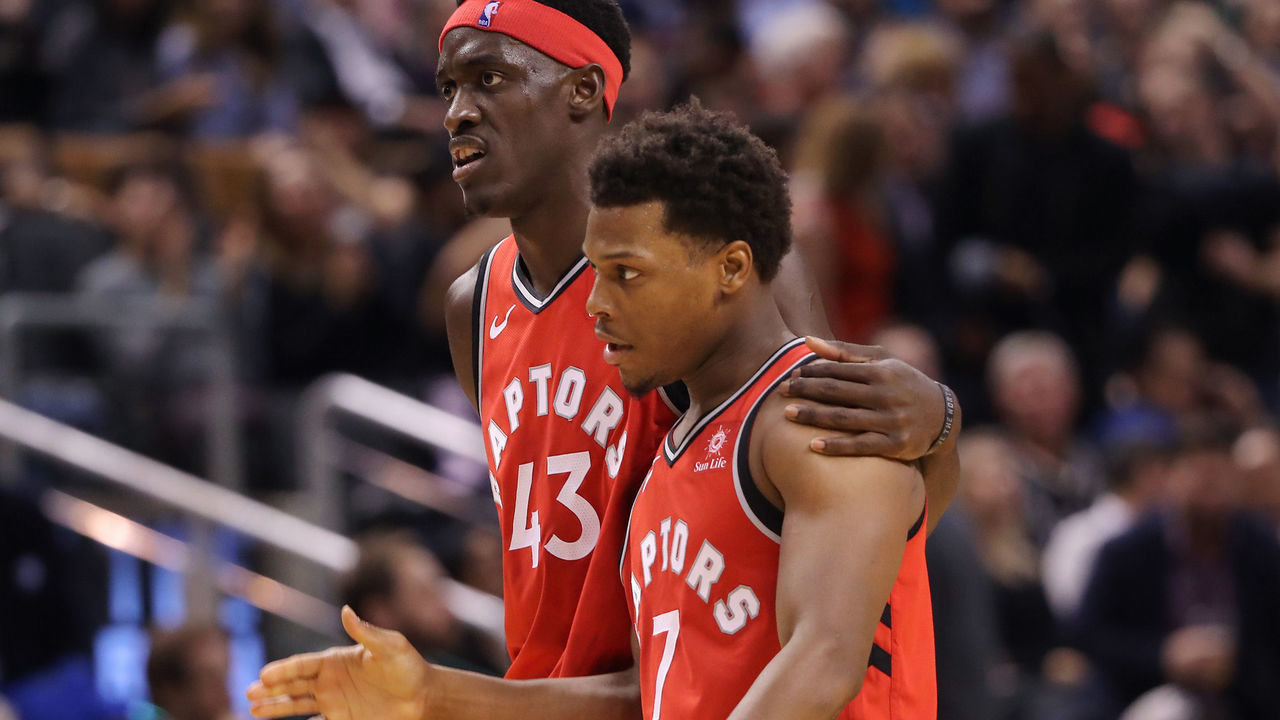 TORONTO, ON - DECEMBER 05: Pascal Siakam #43 of the Toronto Raptors embraces Kyle Lowry #7 as he congratulates Lowry during their NBA game against the Philadelphia 76ers at Scotiabank Arena on December 5, 2018 in Toronto, Canada.