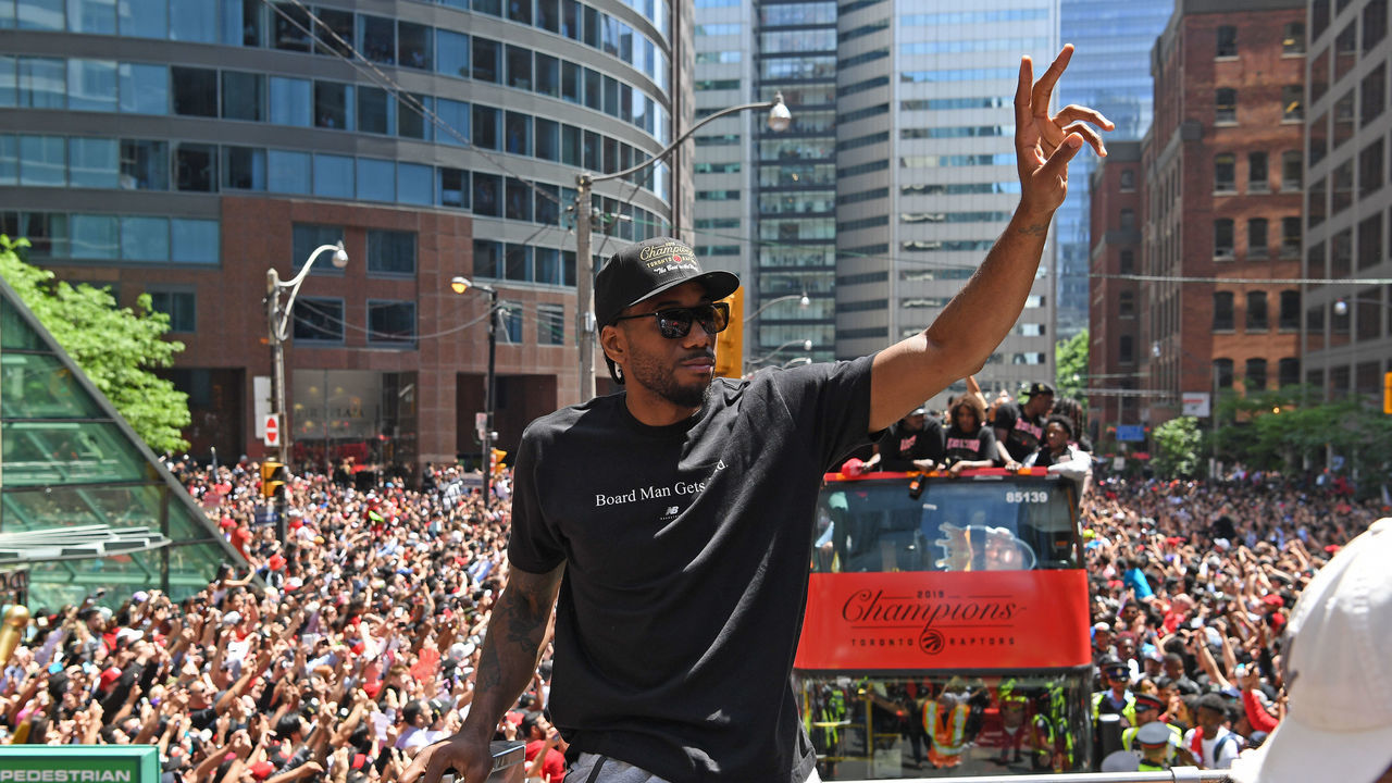 TORONTO, ON - JUNE 17: Kawhi Leonard #2 of the Toronto Raptors acknowledges the crowd during the Toronto Raptors Championship Victory Parade on June 17, 2019 in Toronto, Ontario. NOTE TO USER: User expressly acknowledges and agrees that, by downloading and/or using this photograph, user is consenting to the terms and conditions of Getty Images License Agreement. Mandatory Copyright Notice: Copyright 2019 NBAE