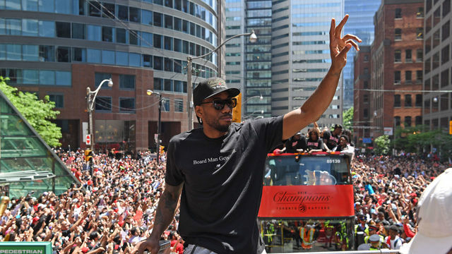 TORONTO, ON - JUNE 17: Kawhi Leonard #2 of the Toronto Raptors acknowledges the crowd during the Toronto Raptors Championship Victory Parade on June 17, 2019 in Toronto, Ontario. NOTE TO USER: User expressly acknowledges and agrees that, by downloading and/or using this photograph, user is consenting to the terms and conditions of Getty Images License Agreement. Mandatory Copyright Notice: Copyright 2019 NBAE