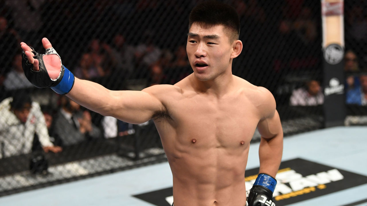 LAS VEGAS, NV - JULY 06: Song Yadong of China celebrates his win over Alejandro Perez of Mexico in their bantamweight fight during the UFC 239 event at T-Mobile Arena on July 6, 2019 in Las Vegas, Nevada.