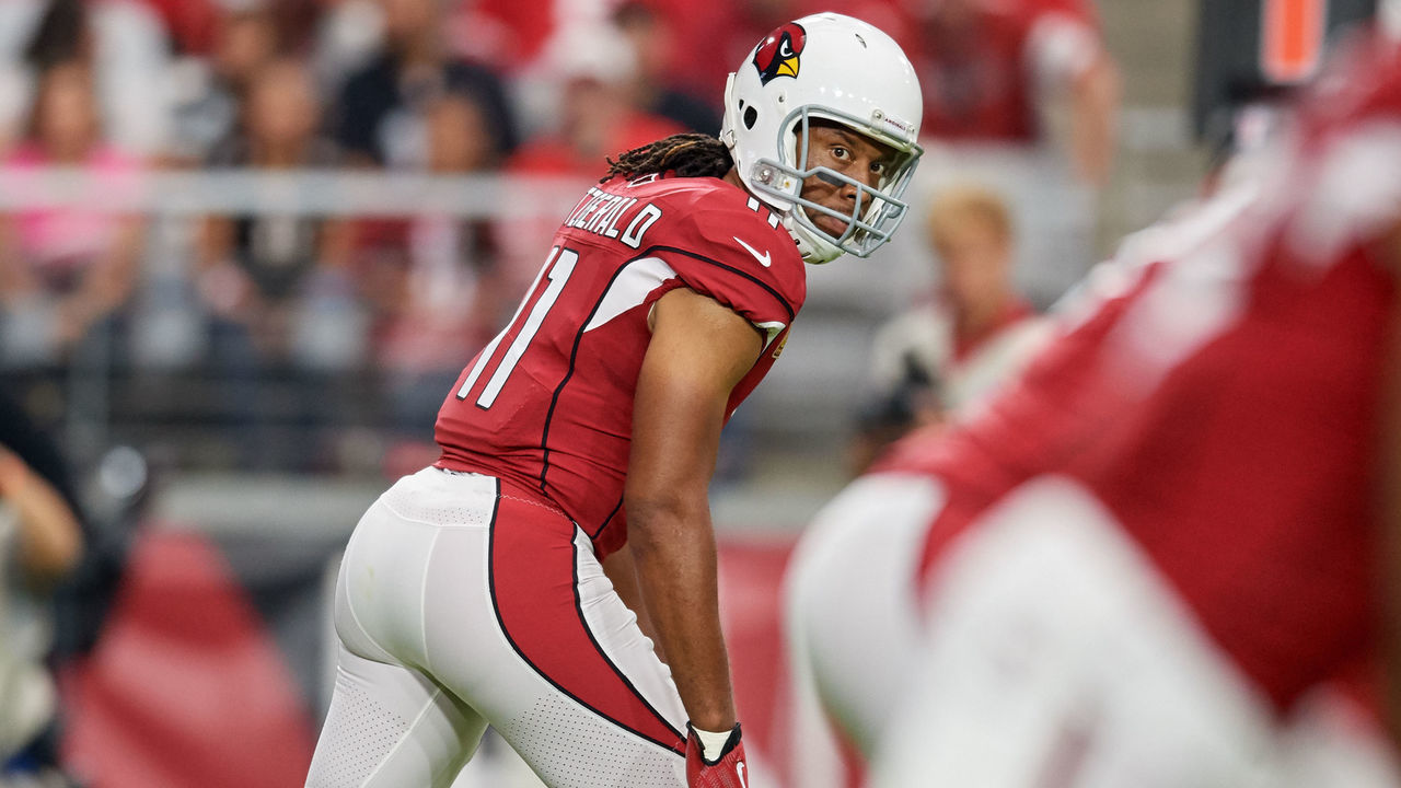 GLENDALE, AZ - OCTOBER 28: Arizona Cardinals wide receiver Larry Fitzgerald (11) looks back at Arizona Cardinals quarterback Josh Rosen (3) in game action during an NFL game between the Arizona Cardinals and the San Francisco 49ers on October 28, 2018 at State Farm Stadium in Glendale, Arizona.