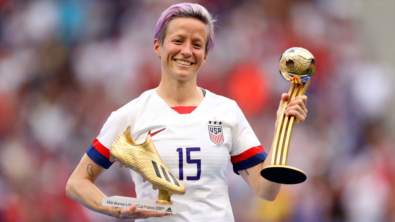 LYON, FRANCE - JULY 07: Megan Rapinoe of the USA poses for a photograph with the Golden Boot award and the Golden Ball award following the 2019 FIFA Women's World Cup France Final match between The United States of America and The Netherlands at Stade de Lyon on July 07, 2019 in Lyon, France.