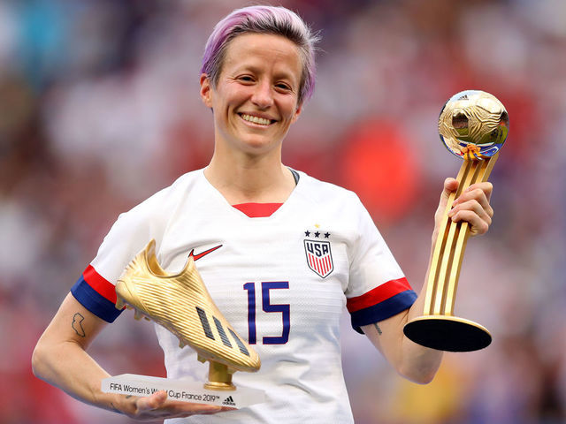 LYON, FRANCE - JULY 07: Megan Rapinoe of the USA poses for a photograph with the Golden Boot award and the Golden Ball award following the 2019 FIFA Women's World Cup France Final match between The United States of America and The Netherlands at Stade de Lyon on July 07, 2019 in Lyon, France.