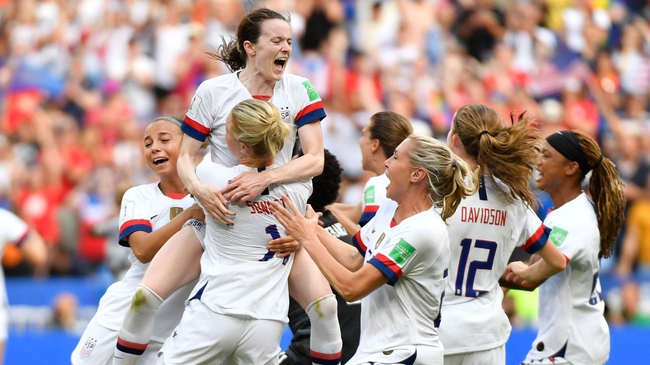 TOPSHOT - USA players celebrate after the final whistle during the France 2019 Womens World Cup football final match between USA and the Netherlands, on July 7, 2019, at the Lyon Stadium in Lyon, central-eastern France.