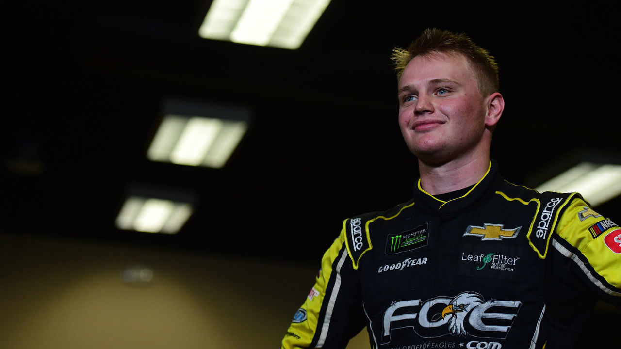 DAYTONA BEACH, FLORIDA - JULY 07: Justin Haley, driver of the #77 Fraternal Order of Eagles Chevrolet, stands in the media center during a weather delay for the Monster Energy NASCAR Cup Series Coke Zero Sugar 400 at Daytona International Speedway on July 07, 2019 in Daytona Beach, Florida. Haley was declared the winner of the Monster Energy NASCAR Cup Series Coke Zero Sugar 400.
