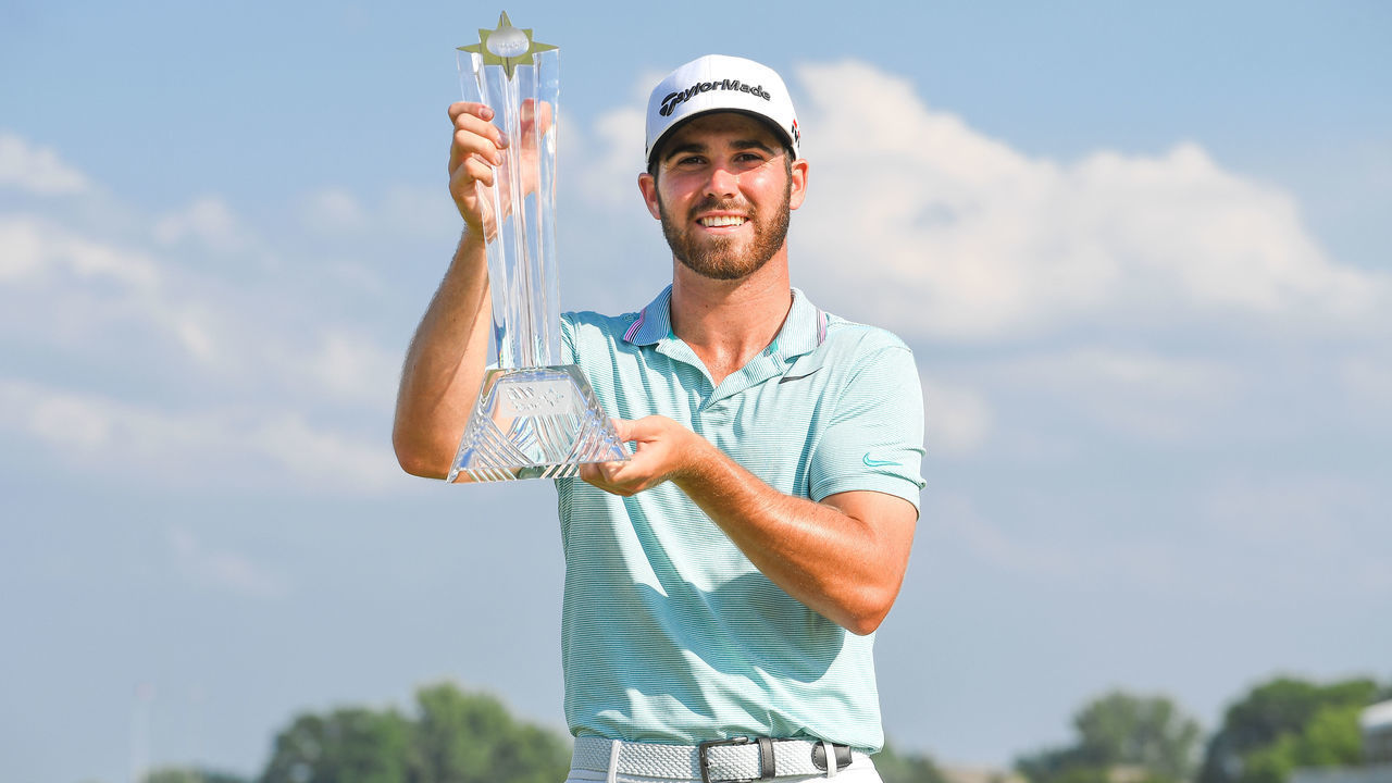 BLAINE, MN - JULY 07: Matthew Wolff poses with the 3M Open trophy on the eighteenth green after the final round of the 3M Open at TPC Twin Cities on July 7, 2019 in Blaine, Minnesota.