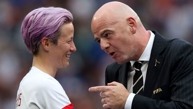LYON, FRANCE - JULY 07: FIFA President Gianni Infantino reacts as he speaks to Megan Rapinoe of USA during the 2019 FIFA Women's World Cup France Final match between The United States of America and The Netherlands at Stade de Lyon on July 7, 2019 in Lyon, France.