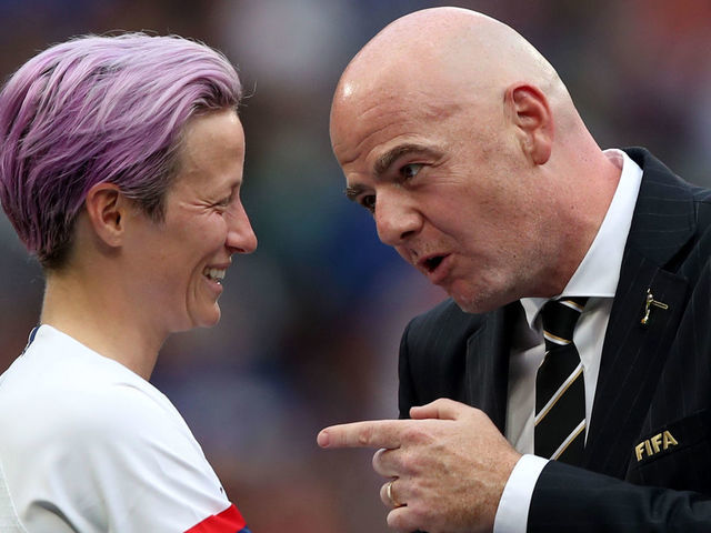 LYON, FRANCE - JULY 07: FIFA President Gianni Infantino reacts as he speaks to Megan Rapinoe of USA during the 2019 FIFA Women's World Cup France Final match between The United States of America and The Netherlands at Stade de Lyon on July 7, 2019 in Lyon, France.