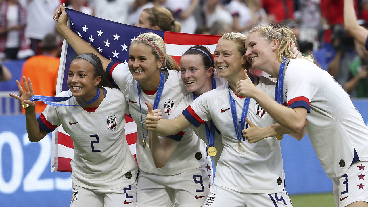 LYON, FRANCE - JULY 7: Mallory Pugh, Lindsey Horan, Rose Lavelle, Emily Sonnett of USA celebrate the victory following the 2019 FIFA Women's World Cup France Final match between The United State of America (USA) and The Netherlands (Holland) at Groupama Stadium on July 7, 2019 in Decines near Lyon, France.