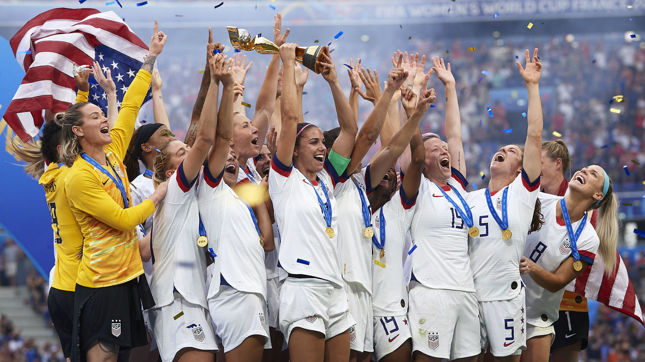 LYON, FRANCE - JULY 07: Players of United States of America lift the trophy after winning the 2019 FIFA Women's World Cup France Final match between The United State of America and The Netherlands at Stade de Lyon on July 07, 2019 in Lyon, France.