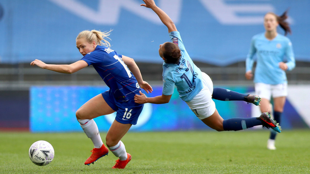 MANCHESTER, ENGLAND - APRIL 14: Magdelena Eriksson of Chelsea and Nikita Parris of Manchester City in action during the Women's FA Cup Semi Final between Manchester City Women and Chelsea Ladies at The Academy Stadium on April 14, 2019 in Manchester, England.