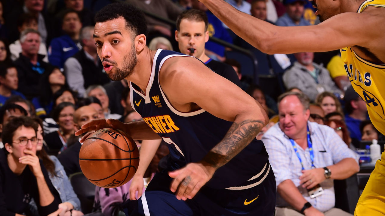 OAKLAND, CA - APRIL 2: Trey Lyles #7 of the Denver Nuggets drives to the basket against the Golden State Warriors on April 2, 2019 at ORACLE Arena in Oakland, California. NOTE TO USER: User expressly acknowledges and agrees that, by downloading and or using this photograph, user is consenting to the terms and conditions of Getty Images License Agreement. Mandatory Copyright Notice: Copyright 2019 NBAE