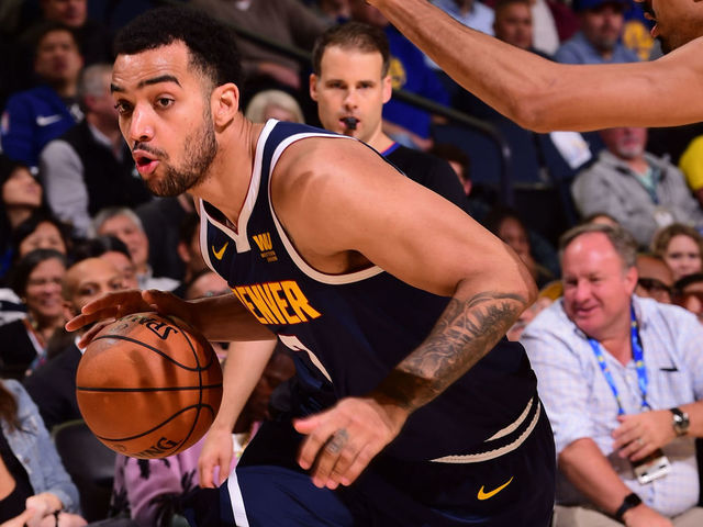 OAKLAND, CA - APRIL 2: Trey Lyles #7 of the Denver Nuggets drives to the basket against the Golden State Warriors on April 2, 2019 at ORACLE Arena in Oakland, California. NOTE TO USER: User expressly acknowledges and agrees that, by downloading and or using this photograph, user is consenting to the terms and conditions of Getty Images License Agreement. Mandatory Copyright Notice: Copyright 2019 NBAE