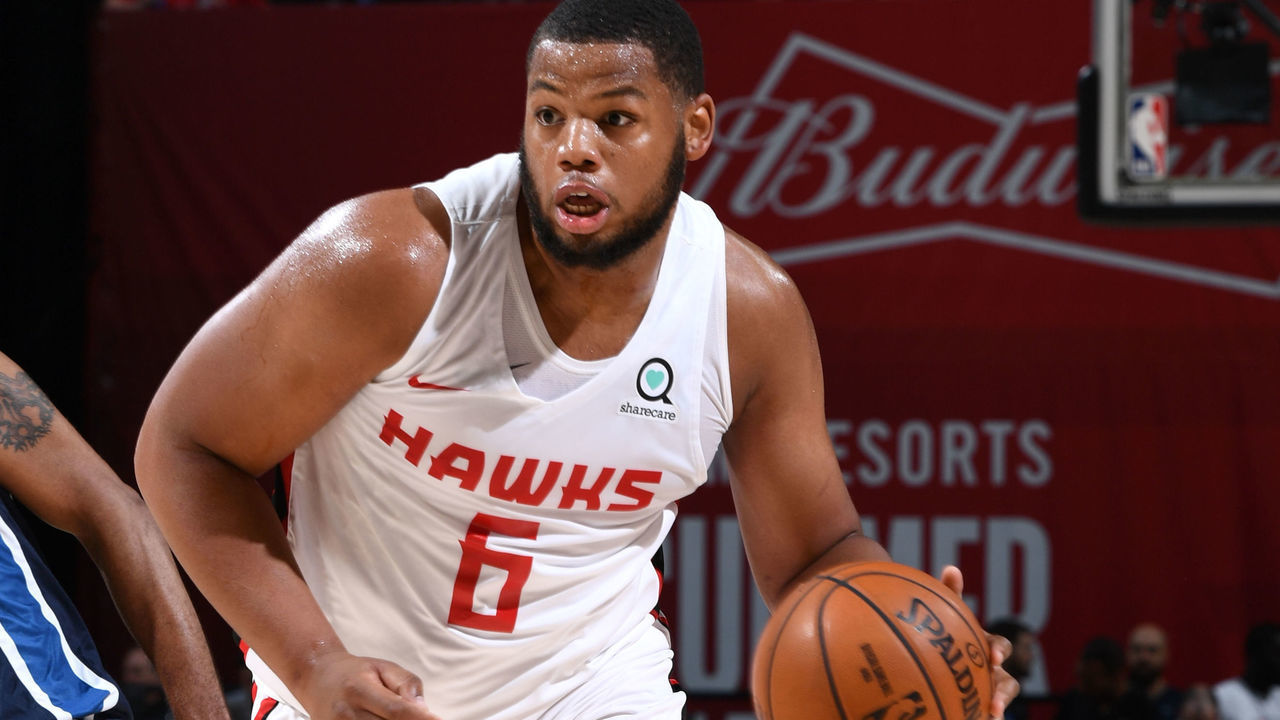LAS VEGAS, NV - JULY 7: Omari Spellman #6 of the Atlanta Hawks drives to the basket against the Minnesota Timberwolves during Day 3 of the 2019 Las Vegas Summer League on July 7, 2019 at the Thomas & Mack Center in Las Vegas, Nevada. NOTE TO USER: User expressly acknowledges and agrees that, by downloading and/or using this Photograph, user is consenting to the terms and conditions of the Getty Images License Agreement. Mandatory Copyright Notice: Copyright 2019 NBAE