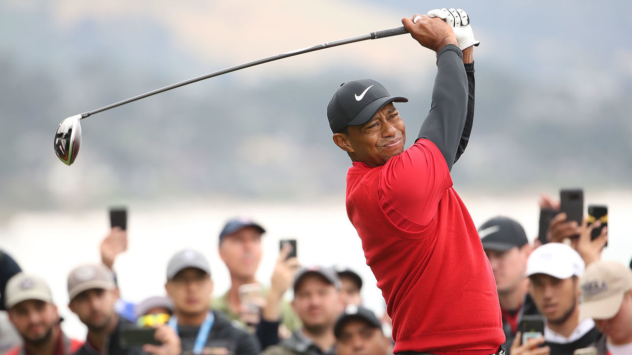PEBBLE BEACH, CALIFORNIA - JUNE 16: Tiger Woods of the United States plays a shot from the 14th tee during the final round of the 2019 U.S. Open at Pebble Beach Golf Links on June 16, 2019 in Pebble Beach, California.