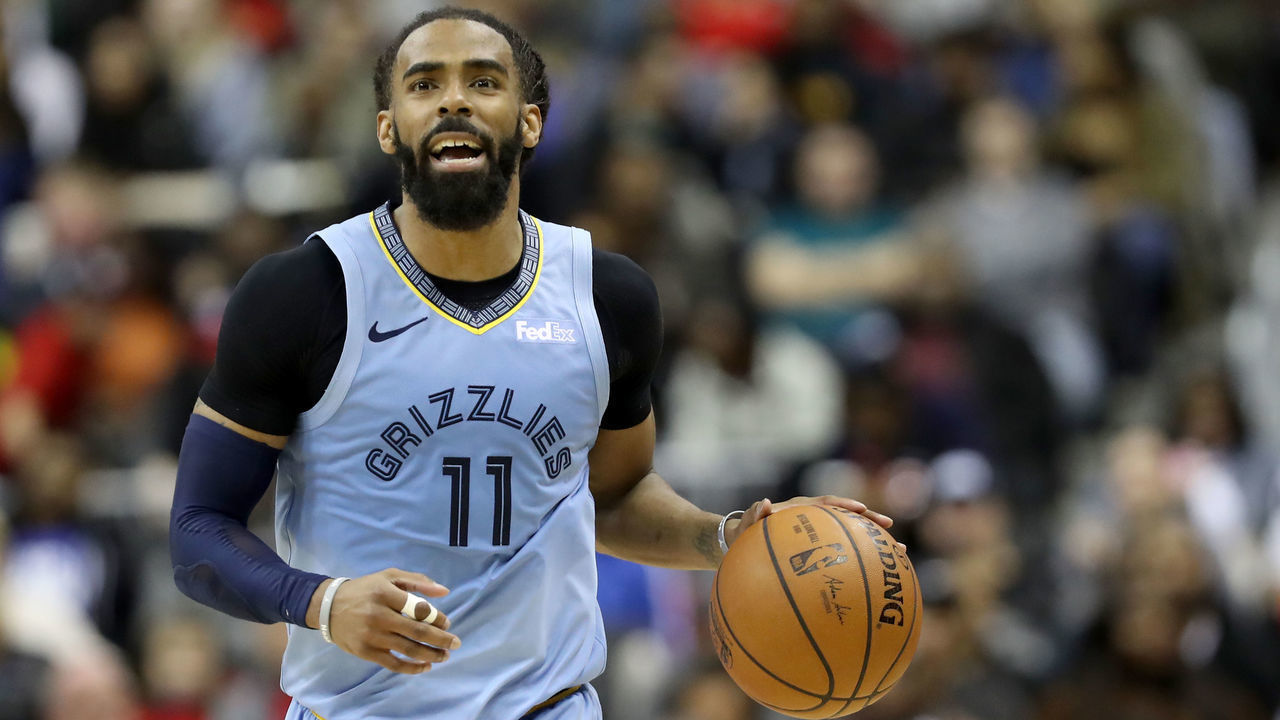 WASHINGTON, DC - MARCH 16: Mike Conley #11 of the Memphis Grizzlies dribbles the ball against the Washington Wizards in the second half at Capital One Arena on March 16, 2019 in Washington, DC.