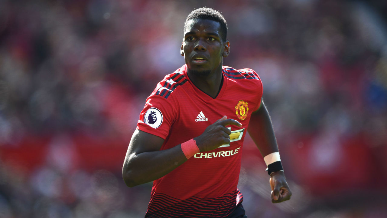 MANCHESTER, ENGLAND - MAY 12: United player Paul Pogba in action during the Premier League match between Manchester United and Cardiff City at Old Trafford on May 12, 2019 in Manchester, United Kingdom.