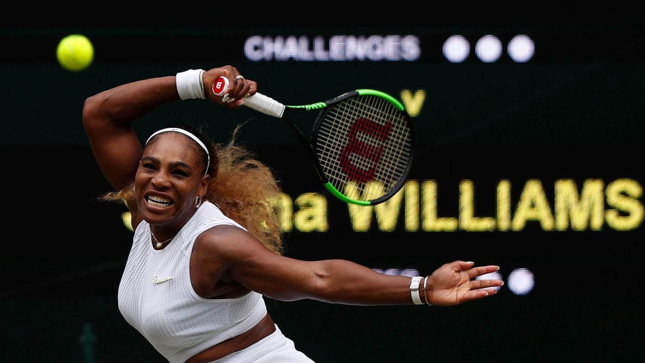 US player Serena Williams returns against US player Alison Riske during their women's singles quarter-final match on day eight of the 2019 Wimbledon Championships at The All England Lawn Tennis Club in Wimbledon, southwest London, on July 9, 2019.