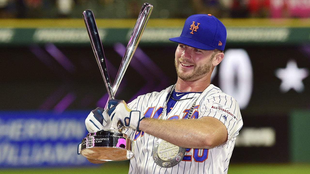 CLEVELAND, OHIO - JULY 08: Pete Alonso of the New York Mets poses with the trophy after winning the T-Mobile Home Run Derby at Progressive Field on July 08, 2019 in Cleveland, Ohio.