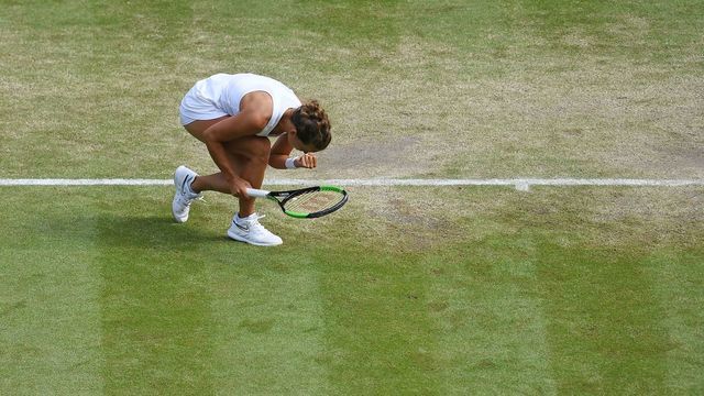 Czech Republic's Barbora Strycova celebrates winning a point in the first set against Britain's Johanna Konta during their women's singles quarter-final match on day eight of the 2019 Wimbledon Championships at The All England Lawn Tennis Club in Wimbledon, southwest London, on July 9, 2019.