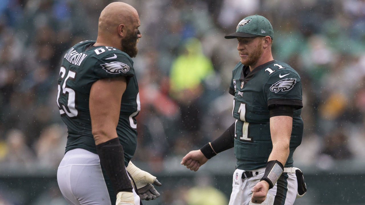 PHILADELPHIA, PA - SEPTEMBER 23: Lane Johnson #65 of the Philadelphia Eagles celebrates with Carson Wentz #11 against the Indianapolis Colts at Lincoln Financial Field on September 23, 2018 in Philadelphia, Pennsylvania.