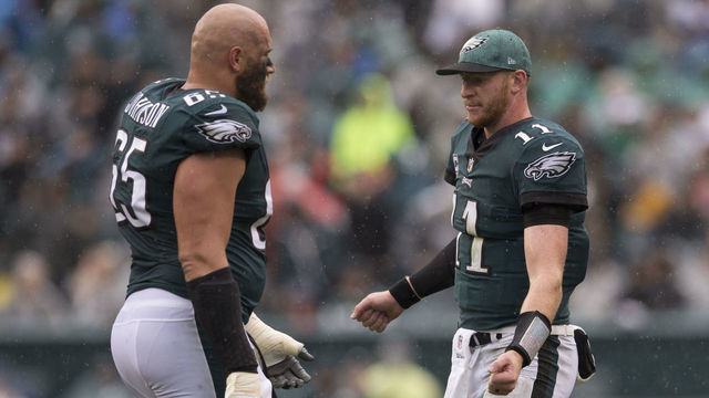 PHILADELPHIA, PA - SEPTEMBER 23: Lane Johnson #65 of the Philadelphia Eagles celebrates with Carson Wentz #11 against the Indianapolis Colts at Lincoln Financial Field on September 23, 2018 in Philadelphia, Pennsylvania.