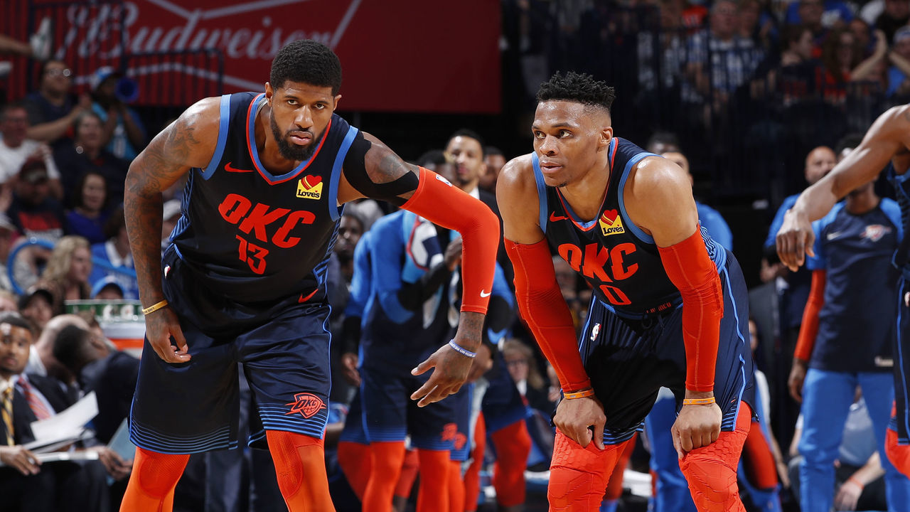 OKLAHOMA CITY, OK - APRIL 9: Paul George #13 speaks with Russell Westbrook #0 of the Oklahoma City Thunder during the game against the Houston Rockets on April 9, 2019 at Chesapeake Energy Arena in Oklahoma City, OK. Mandatory Copyright Notice: Copyright 2019 NBAE