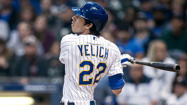 MILWAUKEE, WISCONSIN - MAY 24: Christian Yelich #22 of the Milwaukee Brewers hits a home run in the third inning against the Philadelphia Phillies at Miller Park on May 24, 2019 in Milwaukee, Wisconsin.