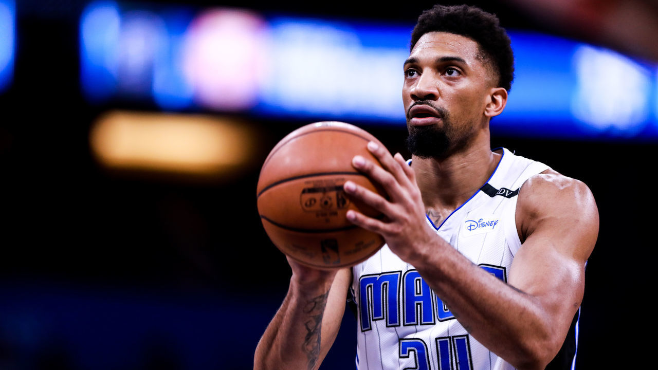 ORLANDO, FLORIDA - MARCH 22: Khem Birch #24 of the Orlando Magic lines up a free throw against the Memphis Grizzlies in the fourth quarter at Amway Center on March 22, 2019 in Orlando, Florida.