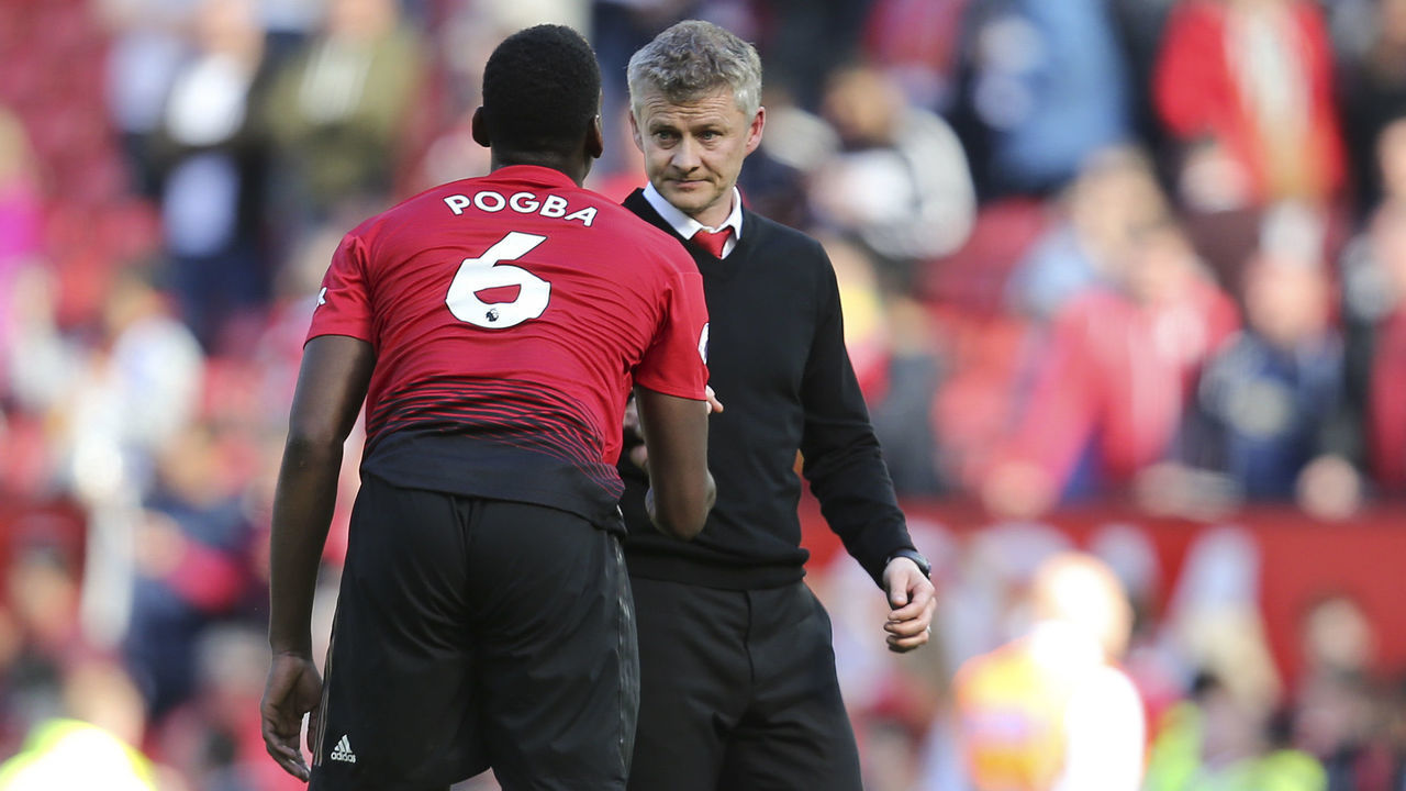 MANCHESTER, ENGLAND - MAY 12: Paul Pogba of Manchester United and Ole Gunnar Solskjaer the head coach / manager of Manchester United after the Premier League match between Manchester United and Cardiff City at Old Trafford on May 12, 2019 in Manchester, United Kingdom.