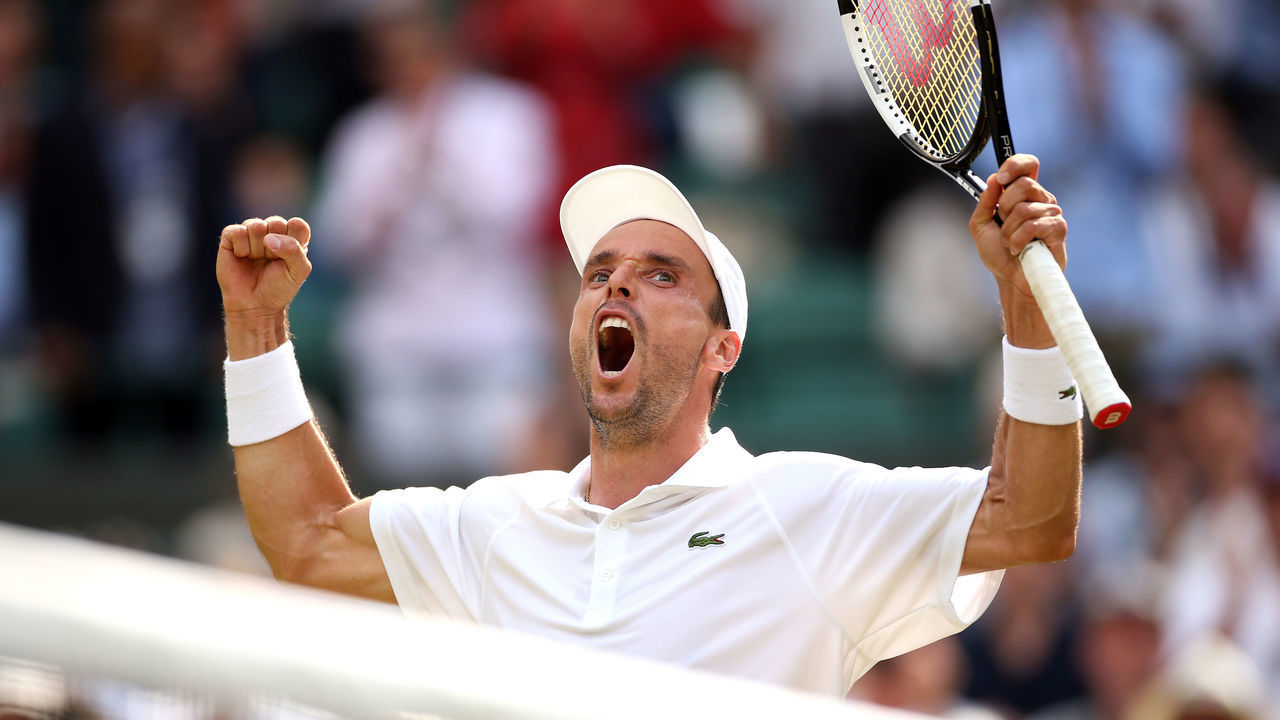 Roberto Bautista Agut celebrates winning the match against Guido Pella (not pictured) on day nine of the Wimbledon Championships at the All England Lawn Tennis and Croquet Club, Wimbledon.