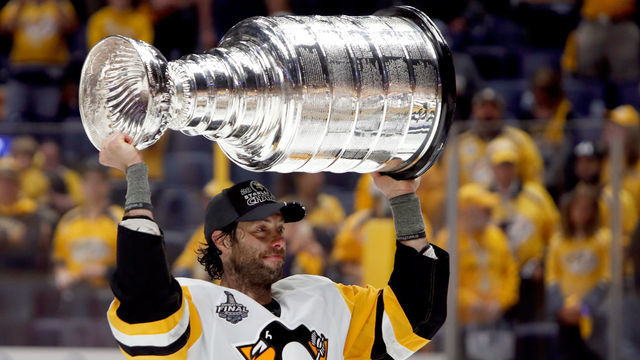 NASHVILLE, TN - JUNE 11: Matt Cullen #7 of the Pittsburgh Penguins celebrates with the Stanley Cup trophy after they defeated the Nashville Predators 2-0 in Game Six of the 2017 NHL Stanley Cup Final at the Bridgestone Arena on June 11, 2017 in Nashville, Tennessee.