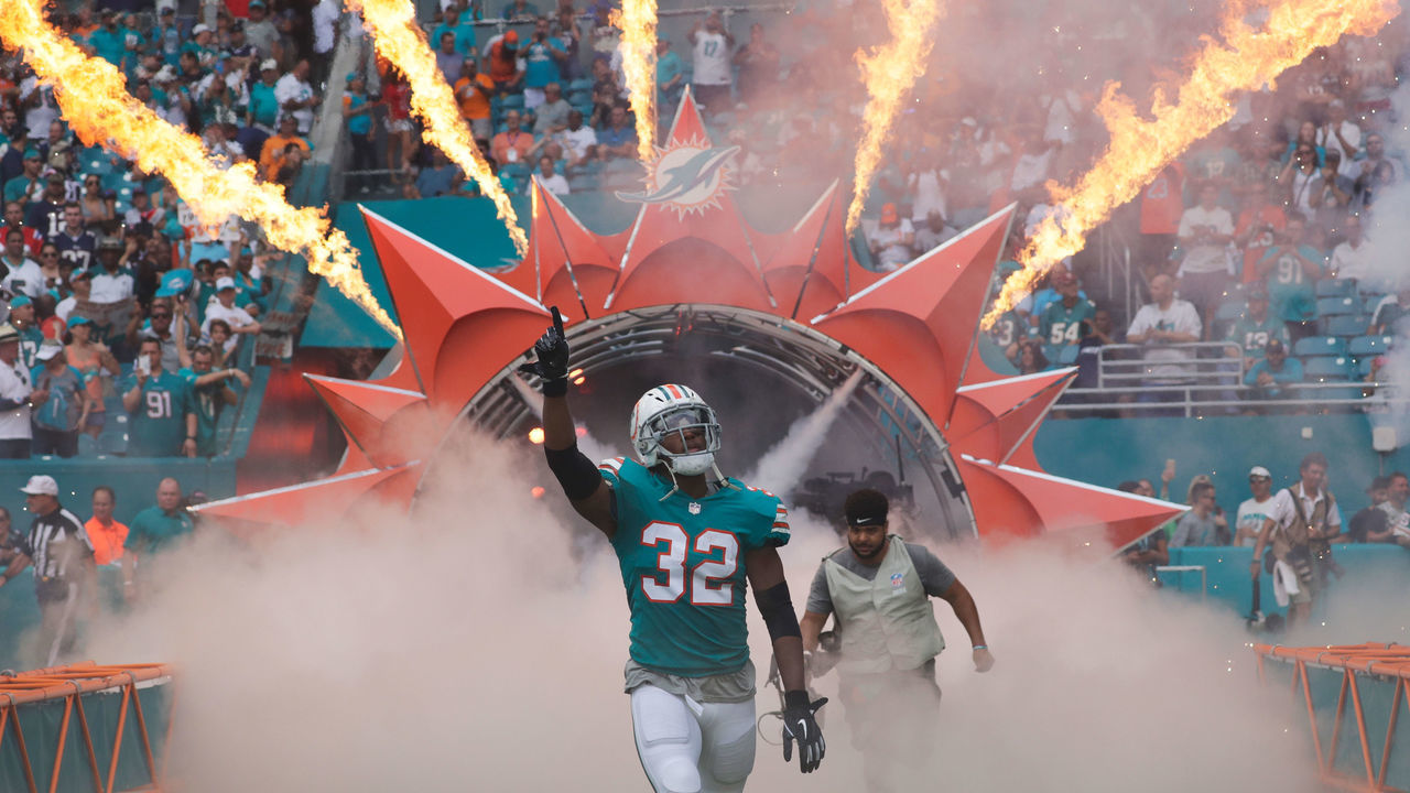 MIAMI, FL - DECEMBER 09: Kenyan Drake #32 of the Miami Dolphins takes the field for their game against the New England Patriots at Hard Rock Stadium on December 9, 2018 in Miami, Florida.