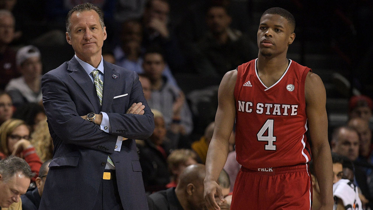 NEW YORK, NY - MARCH 07: Head coach Mark Gottfried of the North Carolina State Wolfpack gestures as Dennis Smith Jr. #4 walks by during their game against the Clemson Tigers during the first Round of the ACC Basketball tournament on March 7, 2017 in New York City.
