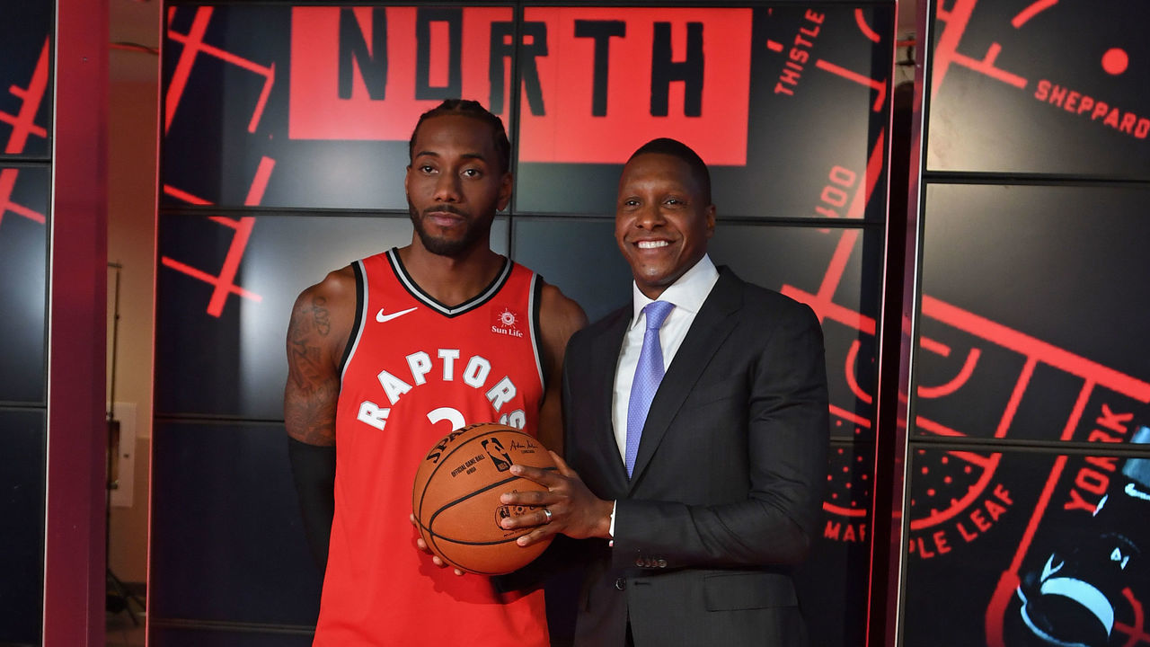 TORONTO, ON - SEPTEMBER 24: Kawhi Leonard #2 and Masai Ujiri of the Toronto Raptors pose for a portrait at a press conference after media day on September 24, 2018 at the Air Canada Centre in Toronto, Ontario, Canada. Mandatory Copyright Notice: Copyright 2018 NBAE
