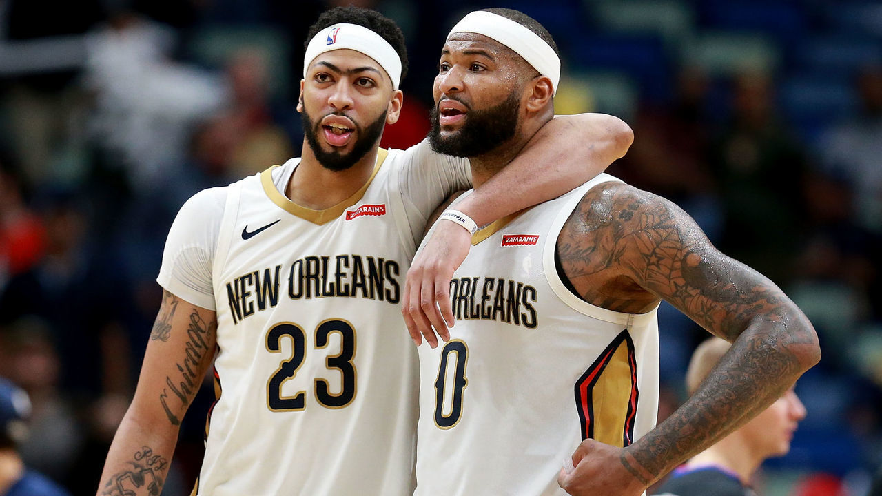 NEW ORLEANS, LA - JANUARY 22: Anthony Davis #23 of the New Orleans Pelicans and DeMarcus Cousins #0 of the New Orleans Pelicans walk of the court during a NBA game against the Chicago Bulls at the Smoothie King Center on January 22, 2018 in New Orleans, Louisiana.