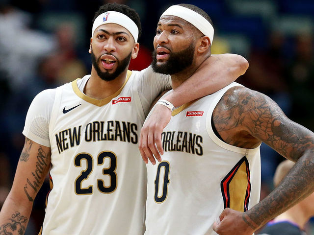 NEW ORLEANS, LA - JANUARY 22: Anthony Davis #23 of the New Orleans Pelicans and DeMarcus Cousins #0 of the New Orleans Pelicans walk of the court during a NBA game against the Chicago Bulls at the Smoothie King Center on January 22, 2018 in New Orleans, Louisiana.