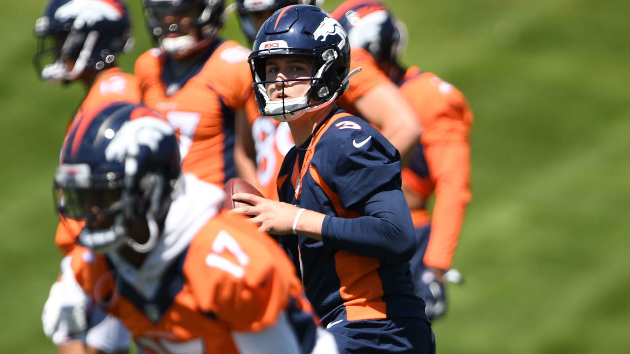 ENGLEWOOD, CO - MAY 13: Denver Broncos quarterback Drew Lock #3 at the line during practice at UCHealth Training Center on May 13, 2019 in Englewood, Colorado.