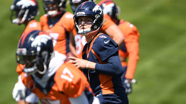 ENGLEWOOD, CO - MAY 13: Denver Broncos quarterback Drew Lock #3 at the line during practice at UCHealth Training Center on May 13, 2019 in Englewood, Colorado.