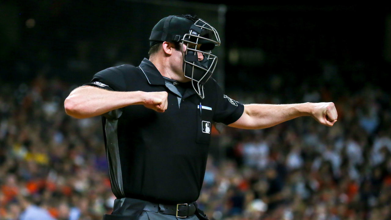 HOUSTON, TX - AUGUST 09: Umpire Nic Lentz (59) calls a strike out on Seattle Mariners catcher Mike Zunino (3) in the top of the third inning during the baseball game between the Seattle Mariners and Houston Astros on August 9, 2018 at Minute Maid Park in Houston, Texas.