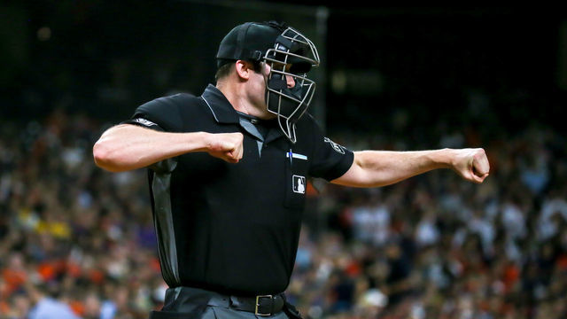 HOUSTON, TX - AUGUST 09: Umpire Nic Lentz (59) calls a strike out on Seattle Mariners catcher Mike Zunino (3) in the top of the third inning during the baseball game between the Seattle Mariners and Houston Astros on August 9, 2018 at Minute Maid Park in Houston, Texas.