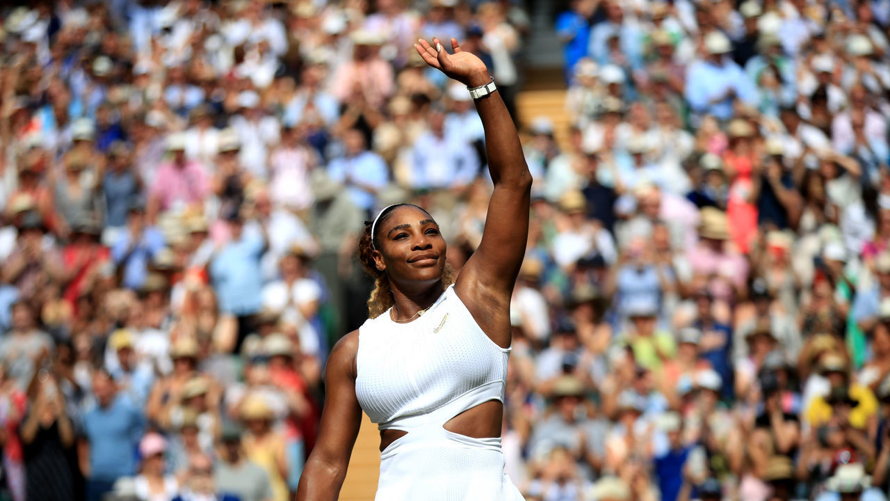 Serena Williams celebrates victory over Barbora Strycova on day ten of the Wimbledon Championships at the All England Lawn Tennis and Croquet Club, Wimbledon.